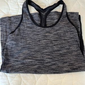 4 Lululemon tank tops and 3 short sleeve tops! All size 12.